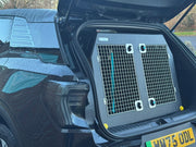 Car trunk with a pet carrier inside, 